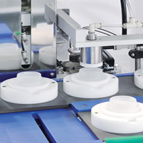 Cream Filling & Capping Machine